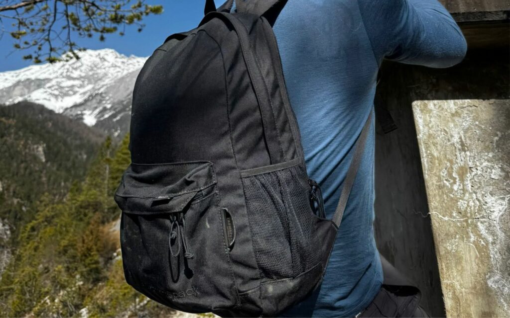 Black technical backpack manufactured by Extremepack