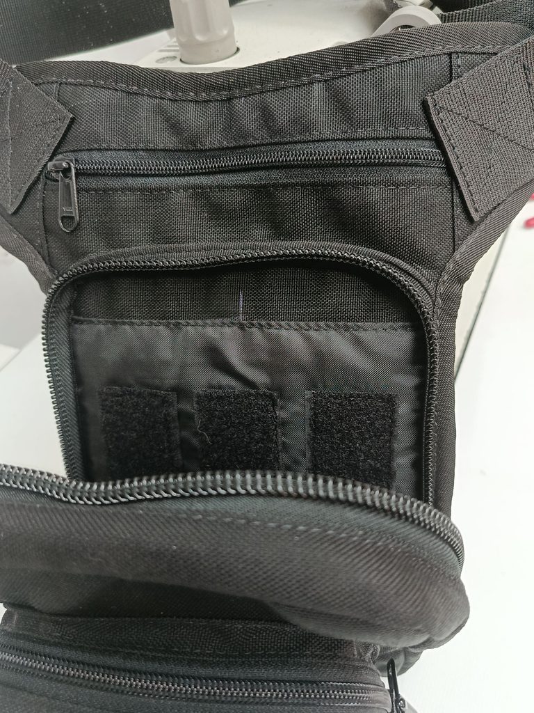 Interior of custom equipment bag with organized compartments